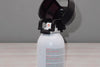 Black Spray Doctor mounted on a spray can in open position, front perspective view